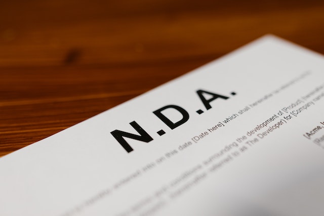 paper with NDA printed at top