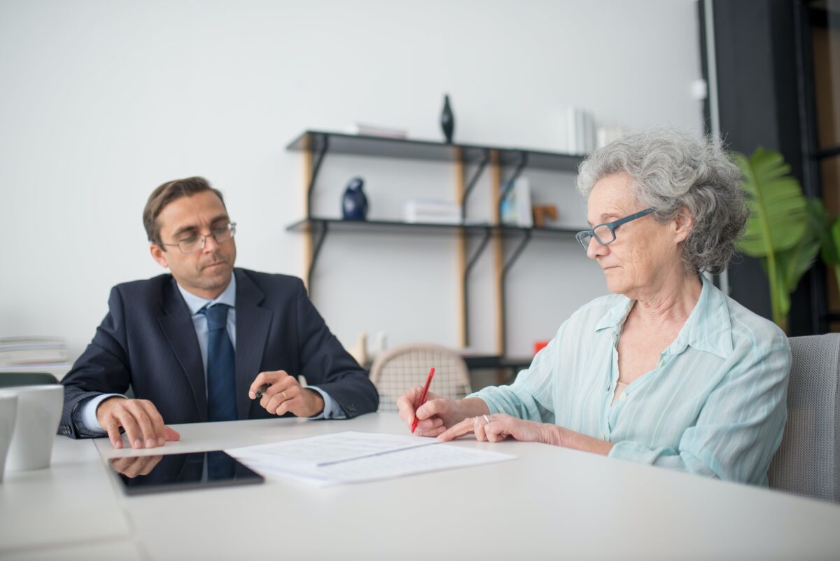 older woman sitting with younger man