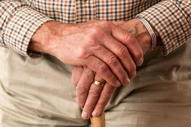 hands of an older man