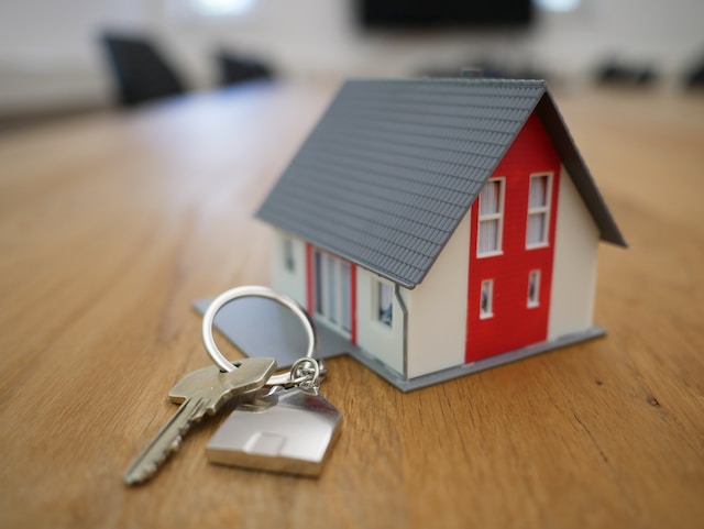 keys next to mini model house